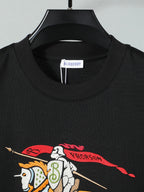 Black crewneck T-shirt front with horse-and-rider graphic detail.