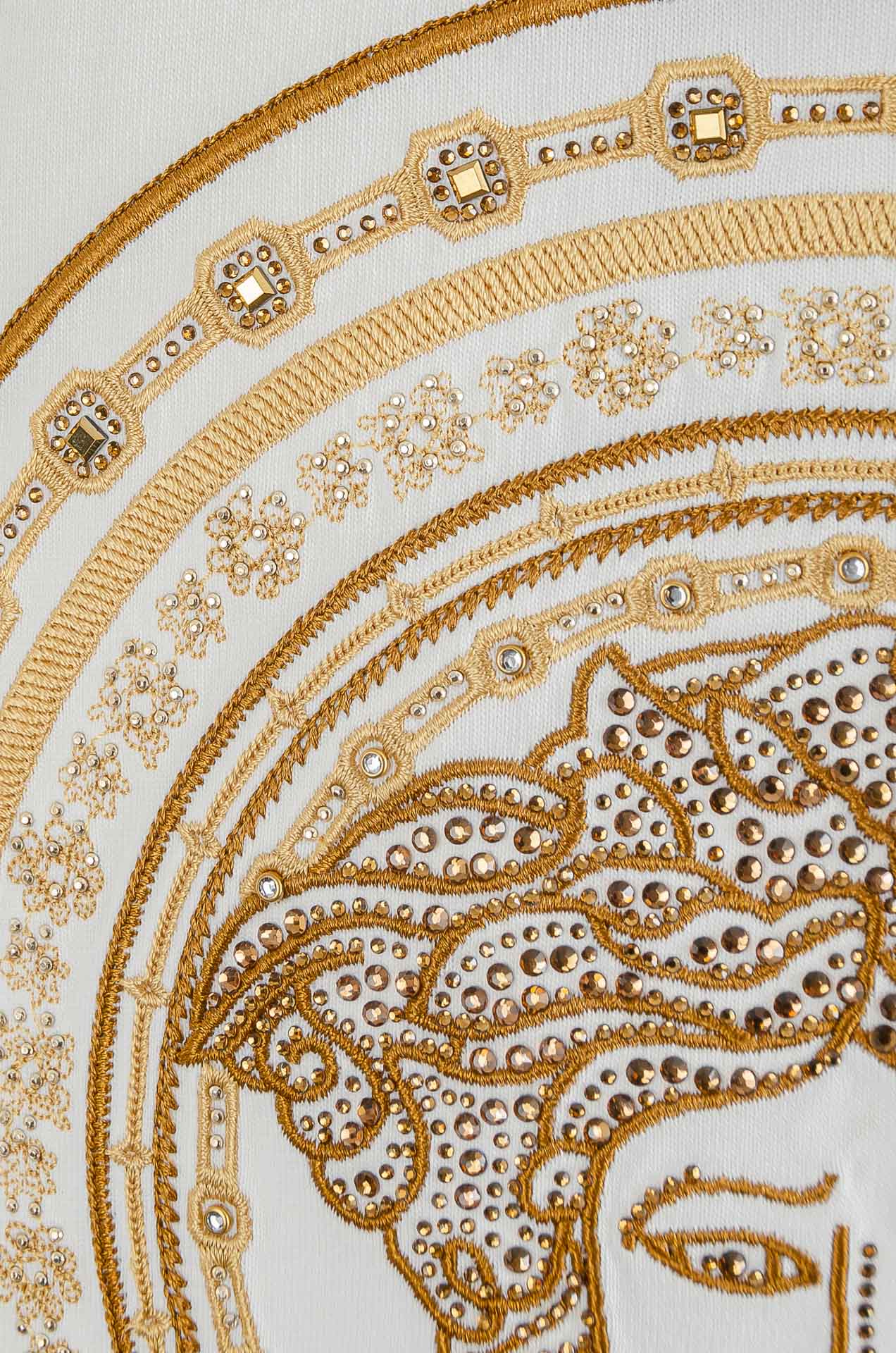 Versace T-shirt circular gold graphic detail with ornate pattern and Medusa face
