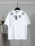 White short-sleeve T-shirt with black flower and charm graphic on the chest