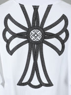 White T-shirt close-up of large black back angel embroidery design