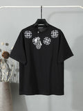 Black short-sleeve T-shirt with white floral crest embroidery on the chest