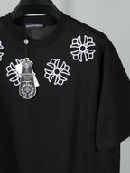 Black short-sleeve T-shirt with white front floral and crest embroidery detail