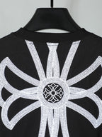 Black short-sleeve T-shirt with large white backburst graphic centered on top