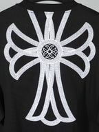 Black short-sleeve T-shirt with oversized white backburst floral emblem
