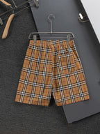 Plaid shorts with drawstring and side seam pockets, tan and black check