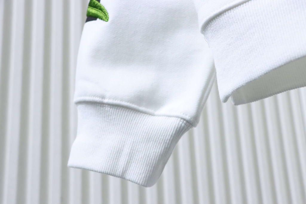 Off-white sweatshirt sleeve cuff and side seam close-up