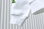 Off-white sweatshirt sleeve cuff and side seam close-up