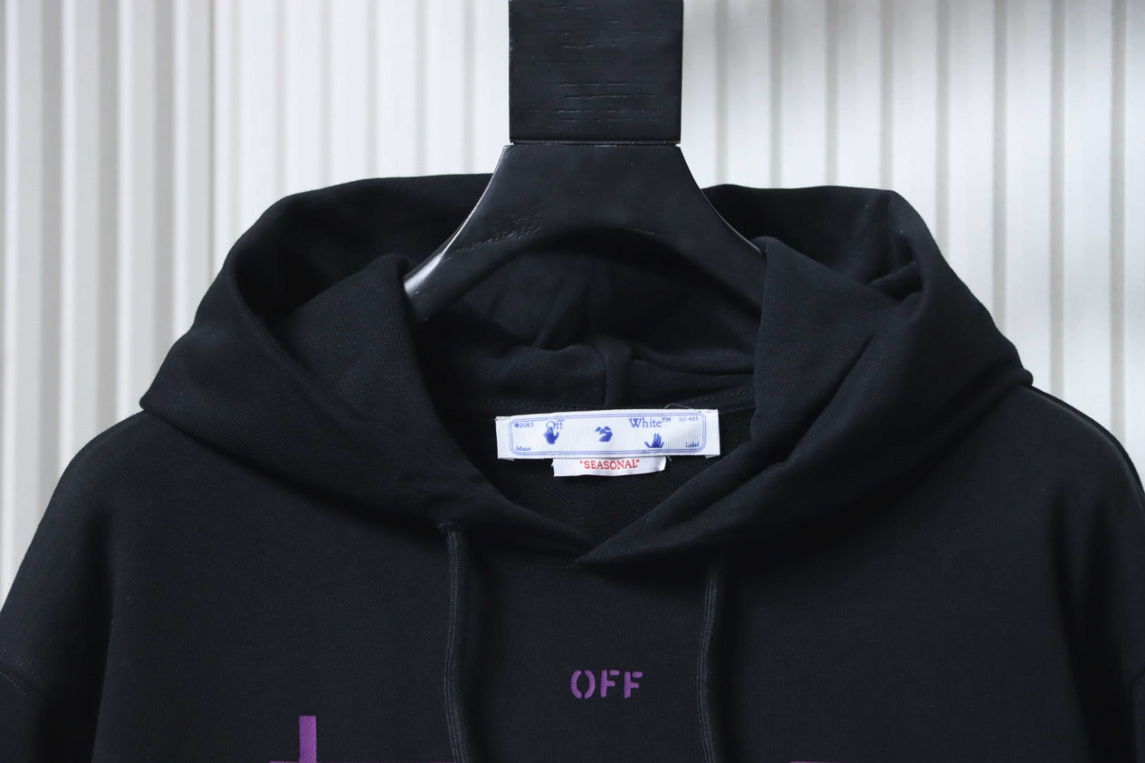 Black hoodie neckline with hood and OFF logo on chest