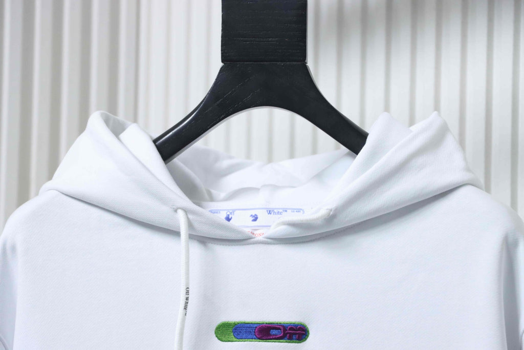 Off-White off-white hoodie close-up of hood with drawstrings and small logo patch.