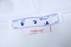 Off-White off-white hoodie care label with Off-White branding and "Seasonal" text.