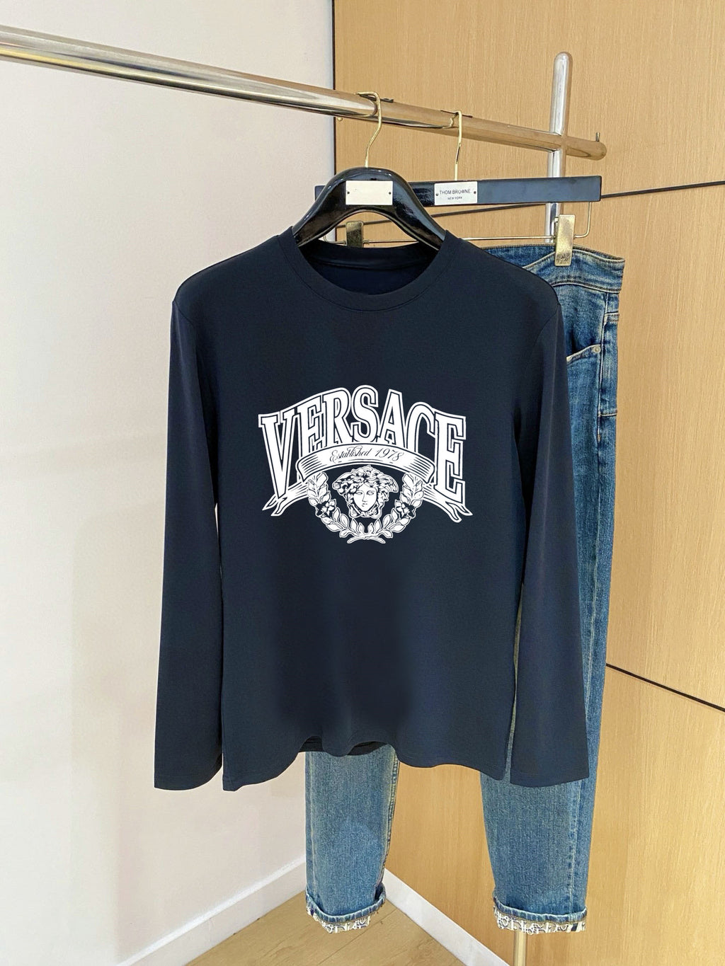 Long-sleeve crewneck top in dark navy with Versace front graphic print