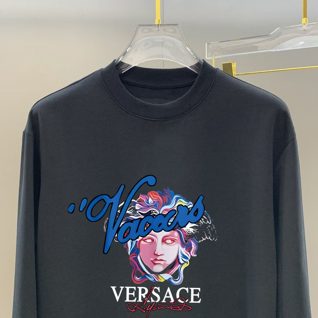 Navy long-sleeve T-shirt close-up of VERSACE face and script logo print