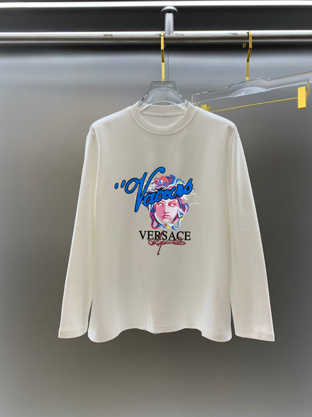 White long-sleeve T-shirt with colorful VERSACE face and script logo print