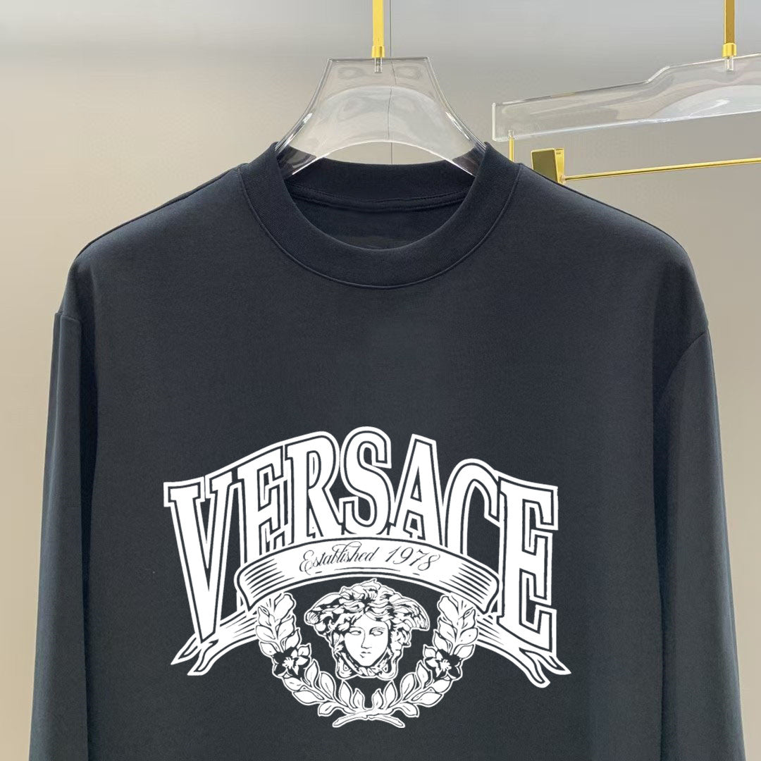 Versace long-sleeve T-shirt, dark navy, close-up of front logo graphic