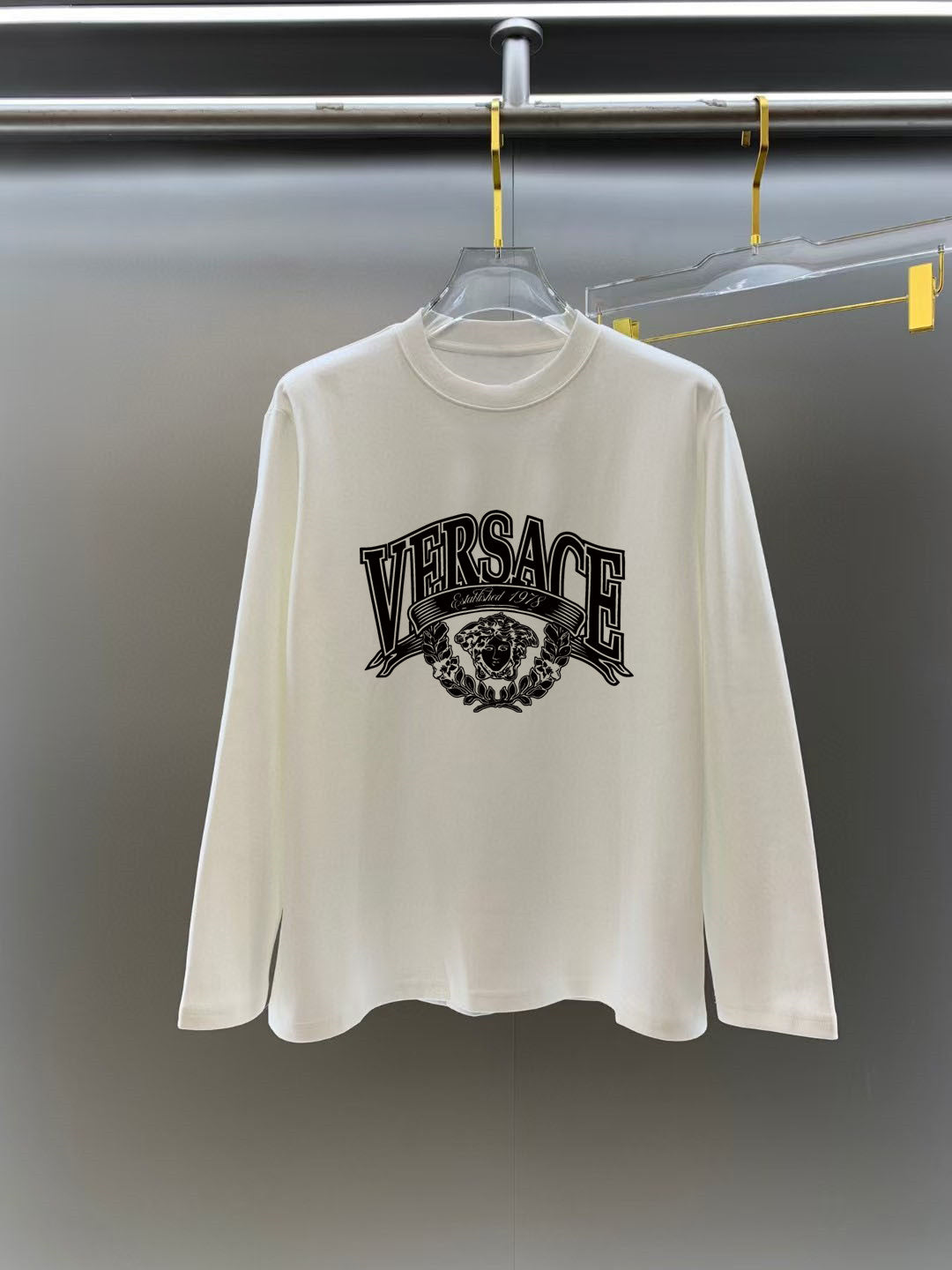Versace long-sleeve T-shirt in off-white/cream with front crest logo print
