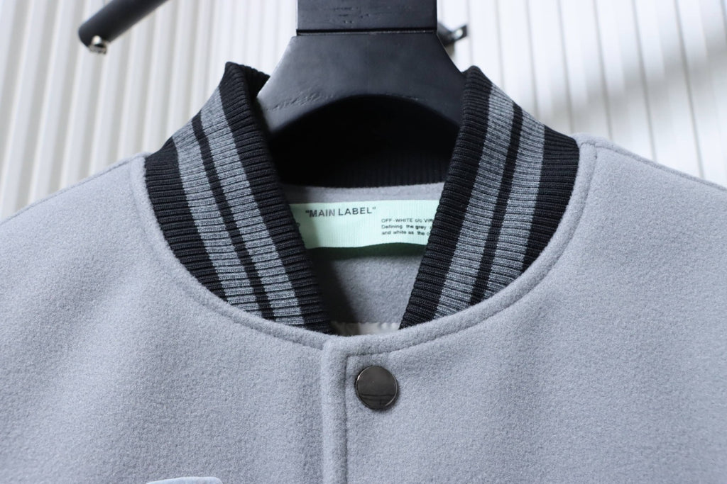 Off White grey jacket neckline with black and gray striped rib trim