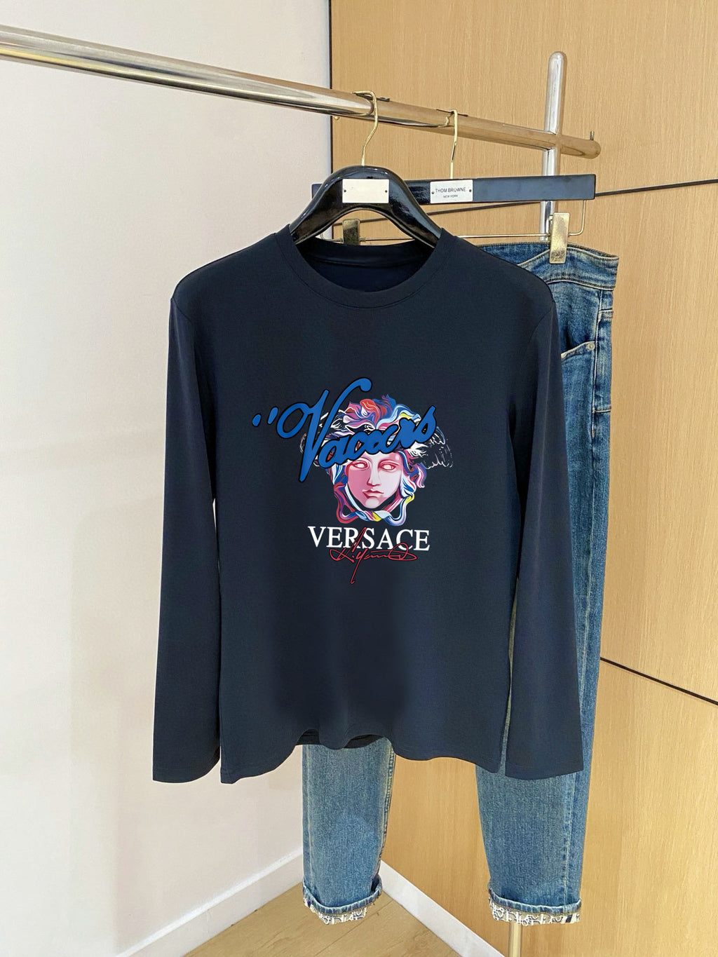 Navy long-sleeve T-shirt with crew neck and colorful graphic logo print