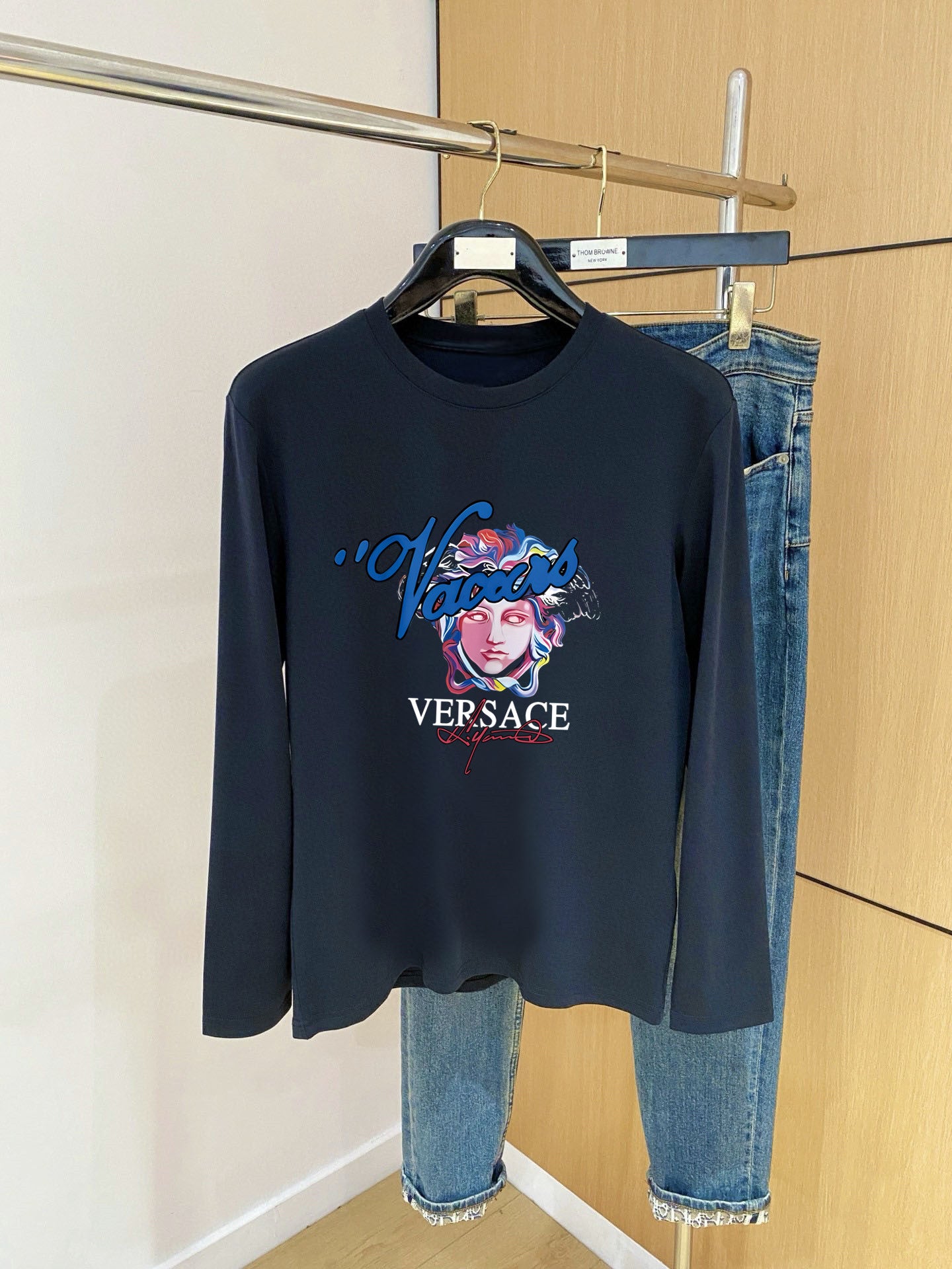 Navy long-sleeve T-shirt with crew neck and colorful graphic logo print