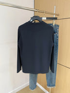 Navy long-sleeve crewneck T-shirt back view on hanger