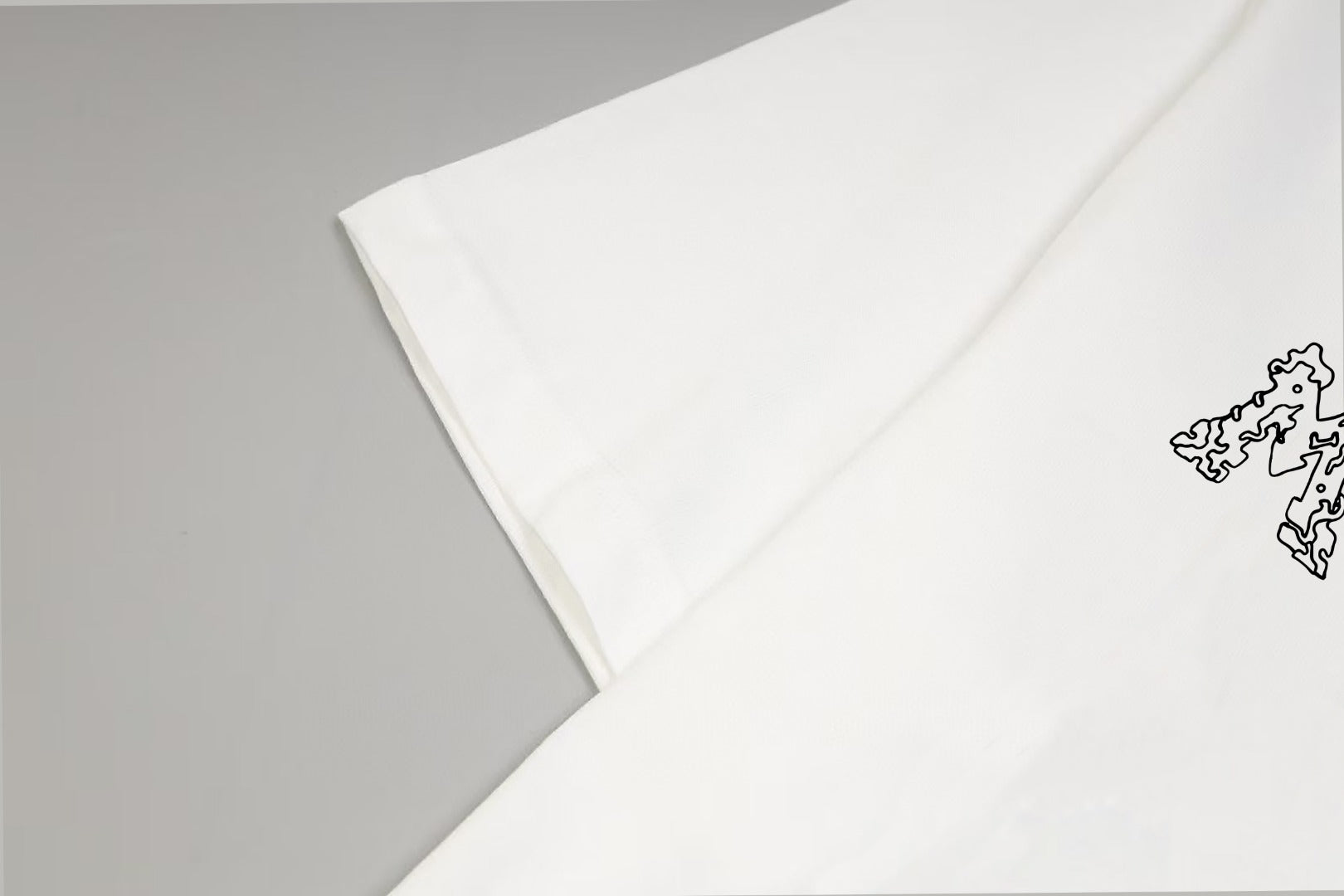 White Moncler T-shirt sleeve with small logo patch detail