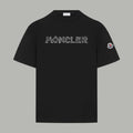 Black Moncler short-sleeve T-shirt with front logo print and round neckline