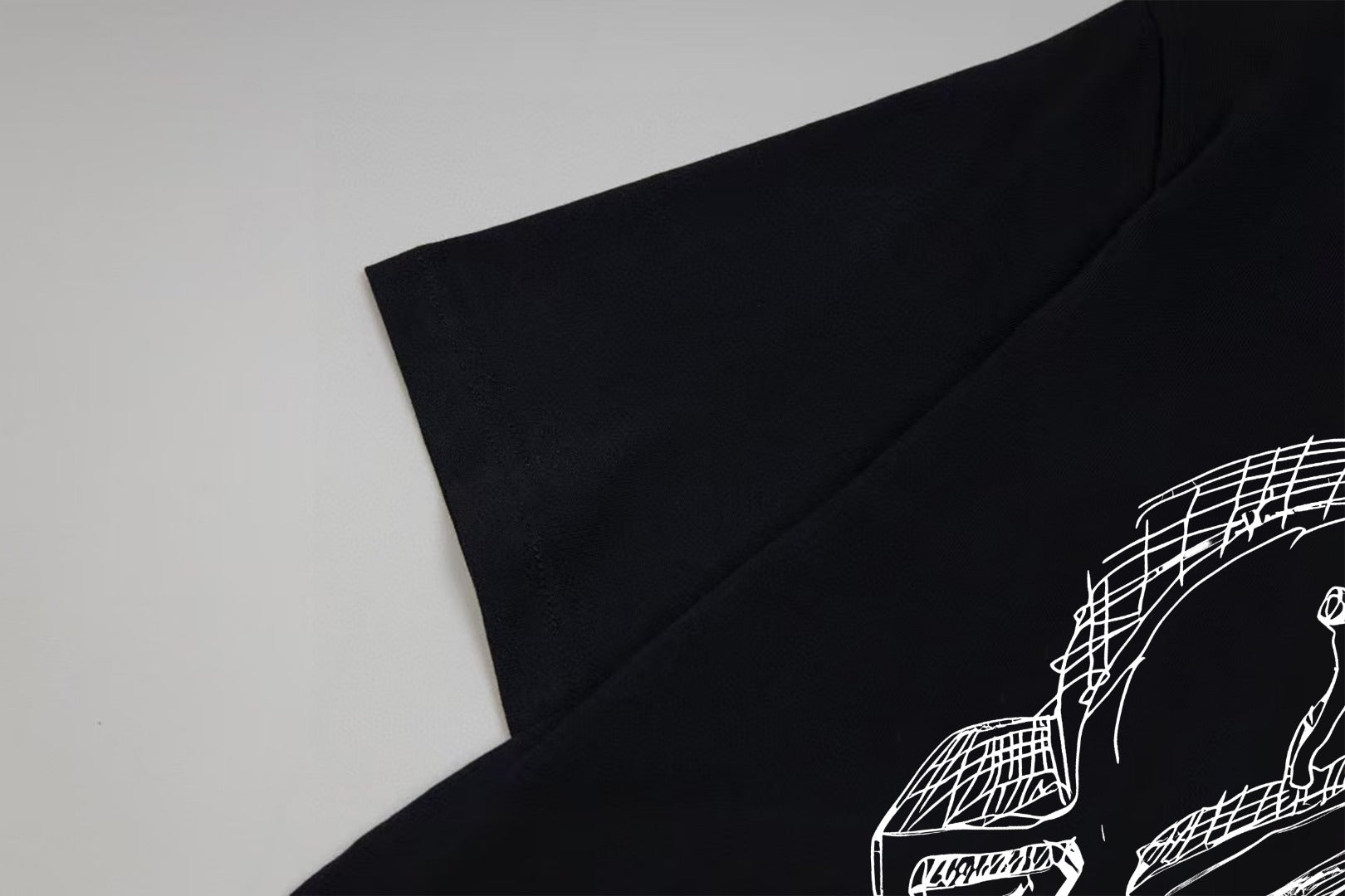 Black Moncler short-sleeve T-shirt with partial front graphic print