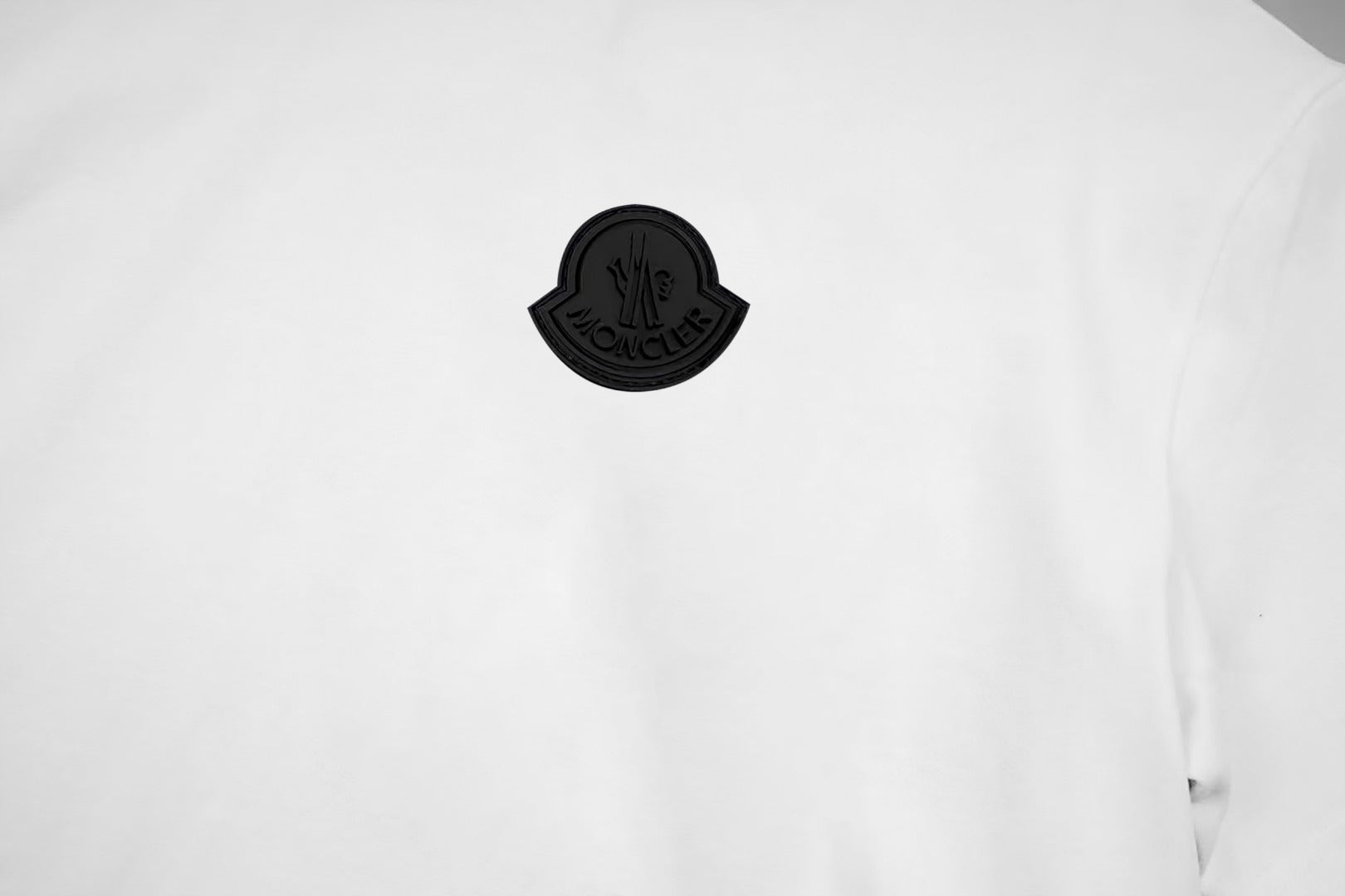 Moncler short-sleeve T-shirt with black logo patch on chest
