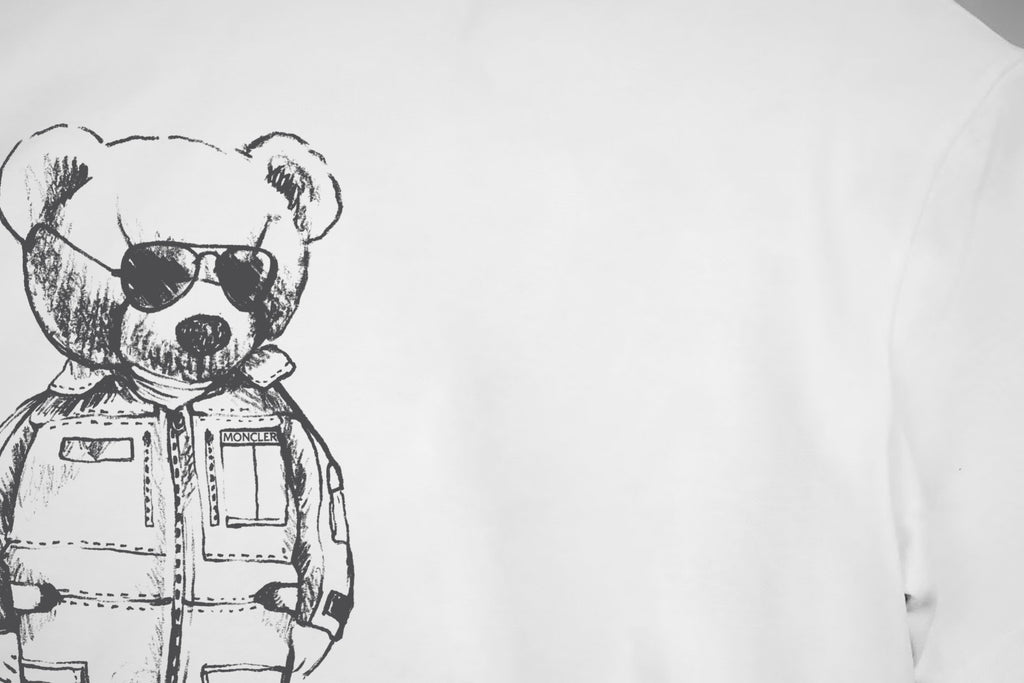 White short-sleeve T-shirt with black bear astronaut illustration