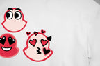 White T-shirt close-up of red cartoon characters and hearts