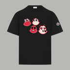 Black short-sleeve T-shirt with red cartoon faces graphic and Moncler sleeve patch