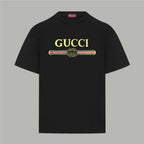 Black Gucci T-shirt with multicolor logo chest graphic