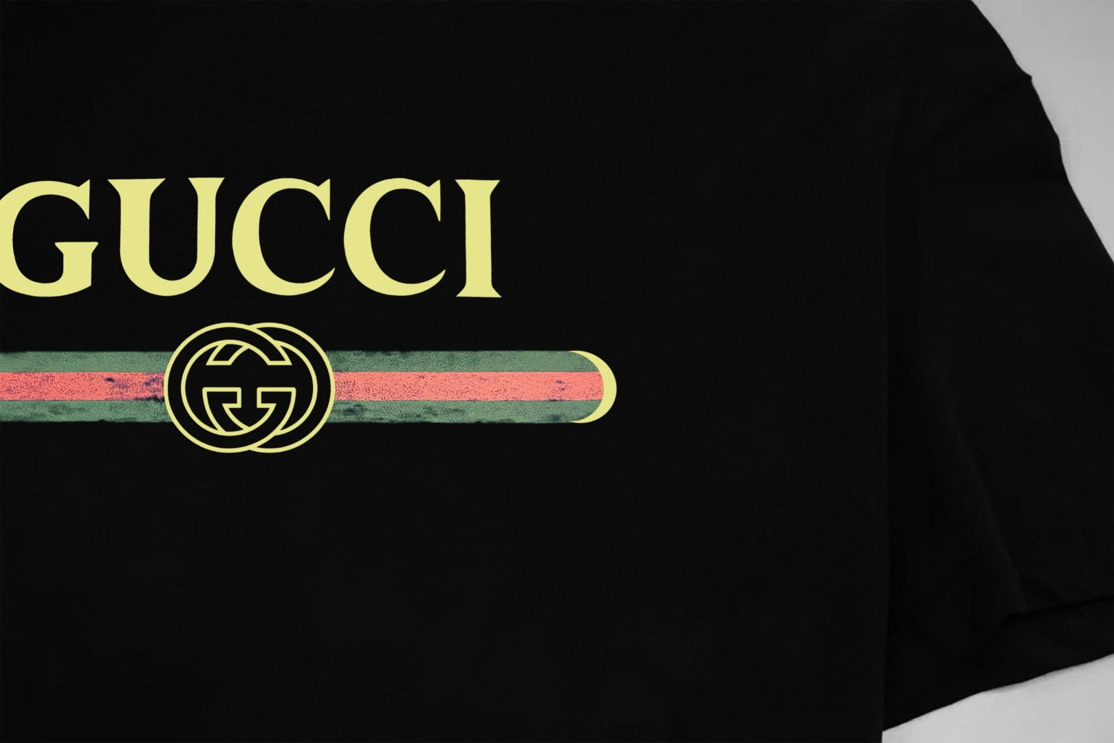 Black Gucci T-shirt with GUCCI wordmark and emblem chest print