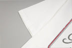 White Gucci T-shirt sleeve and shoulder seam with red stripe graphic edge