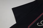 Black Gucci T-shirt sleeve and side seam detail with red trim stripe