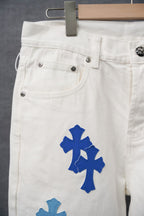 White denim pants with blue cross patch and front pockets