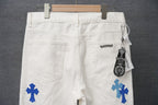 White pants with blue cross patches, front view with hanging tags