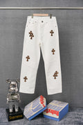 White denim pants with leopard-print cross patches on the legs
