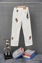 White pants on hanger with leopard-print cross appliques and front coin pocket