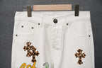 White denim pants with large leopard-print cross patches near the waistband