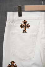 White pants with small leopard-print cross patch and large front pocket