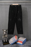 Black chrome pants with cross embroidery, button fly, side pockets