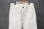 White pants showing waistband, belt loops, and button-front closure