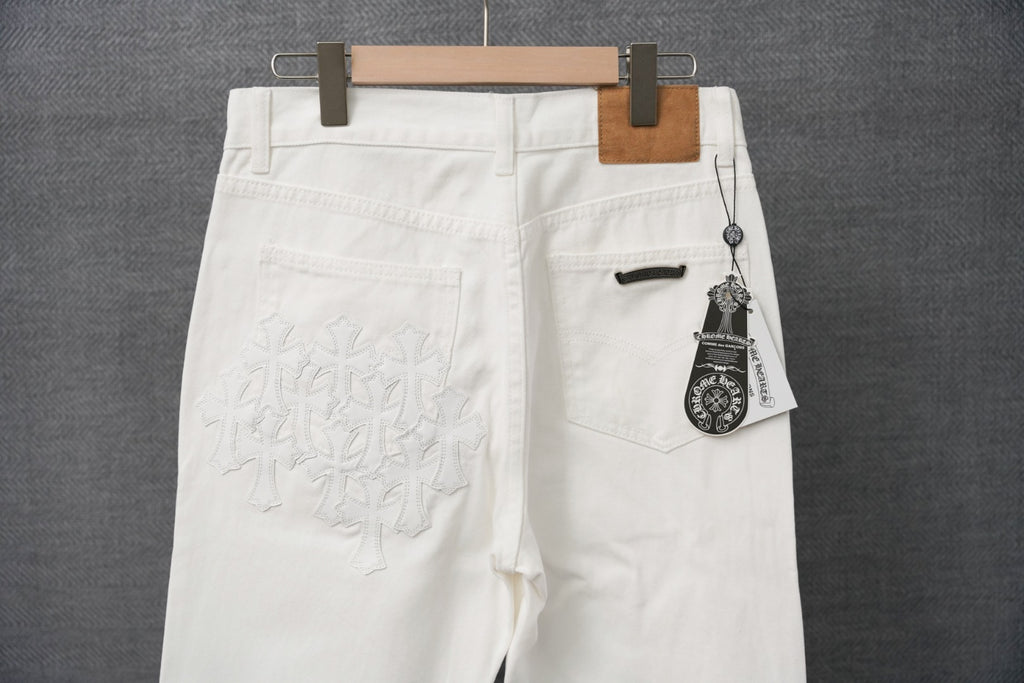 White pants back view with stitched logo detail and buttoned pocket