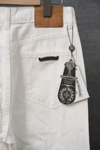 White pants with front pockets, belt loops, and hanging price tag