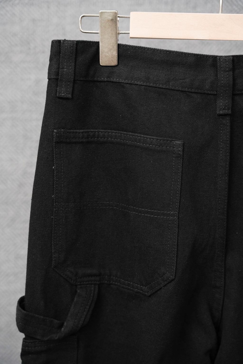 Black pants with front patch pocket and belt loops
