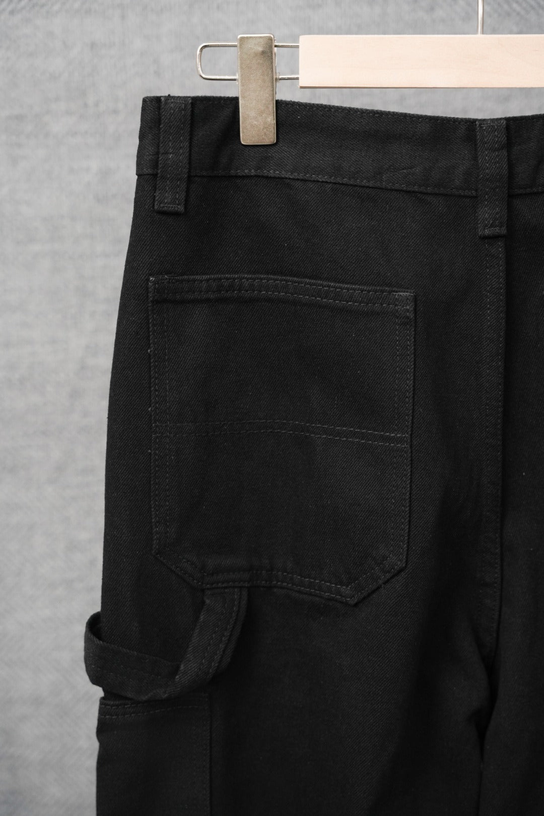 Black pants with front patch pocket and belt loops