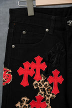 Black Chrome pants front with red cross and leopard-print patch details
