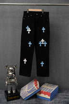 Chrome pants, black with light blue cross patches, front view