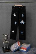 Chrome pants, black with scattered blue cross patches and button fly front