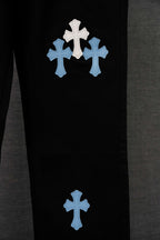 Chrome pants, black with clustered light blue cross graphics on leg